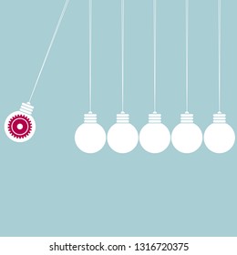 The bulb formed by Newton's cradle. Isolated on blue background.