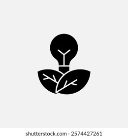 Bulb lamp and leaf icon glyph, free energy, ecology, renewable and green energy concept. Solid black icon.