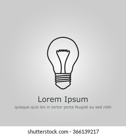 Bulb light icon on grey background with text and slogan