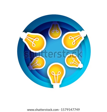 Bulb light idea in paper craft style. Origami bright Electric bulb for creativity, startup, brainstorming, business. Blue layered circle background.