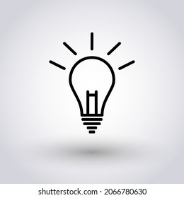 Bulb outline icon on grey gradient background. Black vector icon of ssource of light.