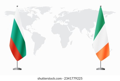 Bulgaria and Ireland flags for official meeting against background of world map.