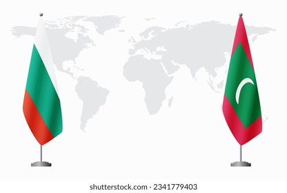 Bulgaria and Maldives flags for official meeting against background of world map.