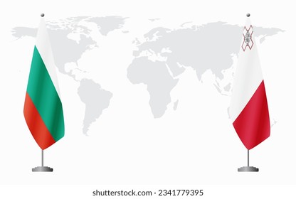 Bulgaria and Malta flags for official meeting against background of world map.