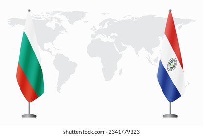 Bulgaria and Paraguay flags for official meeting against background of world map.