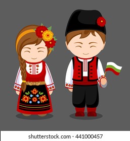 Bulgarians in national dress with a flag. A man and a woman in traditional costume. Travel to Bulgaria. People. Vector flat illustration.