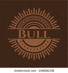 Bull badge with wooden background