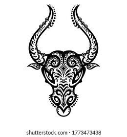 The bull in the ethnic style. Indian motifs. Vector graphics for Tattoos. Happy new year to 2021. Taurus as a symbol of the zodiac. The outline of the bull.