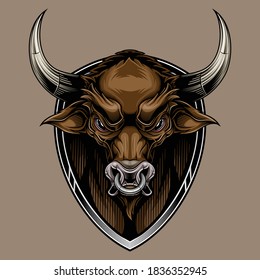 Bull head on shield mascot. Colorful vector illustration in stylish engraving technique of bull head with steel ring in his nose. Isolated on brown background.