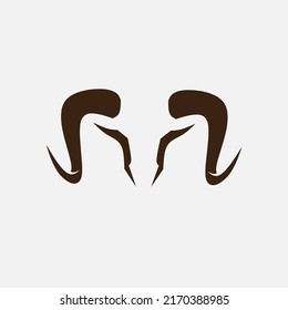 Bull minimalist logo. Simple negative space vector design. Isolated with soft background.