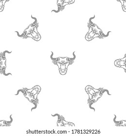 Bull pattern. Decorative animal head. Vector illustration. Symbol of the year. Silhouette. Vintage stylish buffalo. Christmas background. Suitable for textiles, wrapping paper, fabrics, banners.