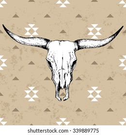 Bull skull with horns on native americans background with traditional ornament