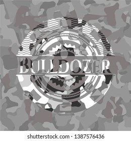 Bulldozer on grey camouflaged pattern