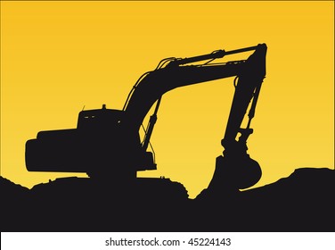 a bulldozer on a sunset