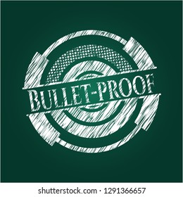 Bullet-proof chalkboard emblem on black board