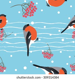 Bullfinch and berberry branch seamless pattern. Vector blue holiday snow winter background. Bird and forest berry print.