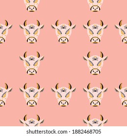 The bull's head is a symbol of prosperity in Chinese tradition. Bull symbol of 2021. Vector graphic seamless pattern
