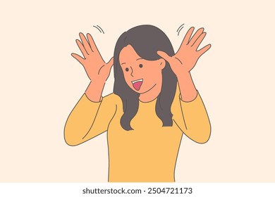 Bully girl makes funny grimace, sticking out tongue and putting palms to ears to amuse interlocutor. Teenager shows funny face, wanting to see laughter and positive emotions in small child.