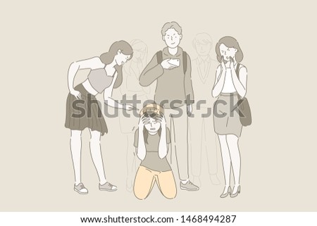 Bullying at school and problem of mockery. Sad teenage girl sitting on floor surrounded by classmates mocking her, taking photos on smartphones scoffing. Сyberbullying. 