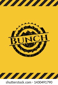 Bunch black grunge emblem with yellow background. Vector Illustration. Detailed.