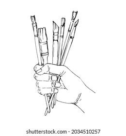 A bunch of brushes in a hand. A vector format sketch in black and white colors.
