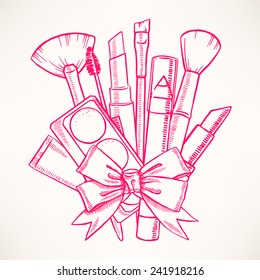 bunch of decorative cosmetics tied with beautiful ribbon