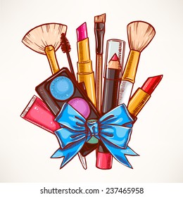 bunch of decorative cosmetics tied with blue ribbon