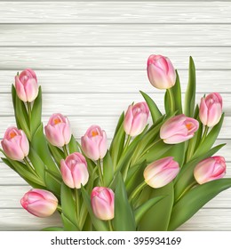 Bunch of fresh spring pink tulips on old vintage wooden board, copy space. EPS 10 vector file included