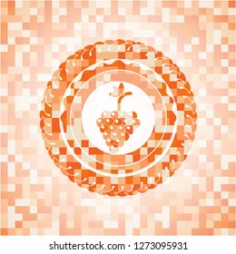 bunch of grapes icon inside abstract orange mosaic emblem