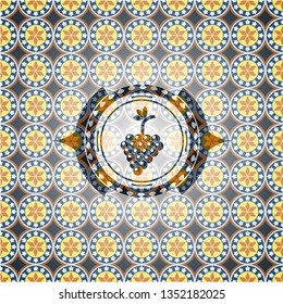 bunch of grapes icon inside arabic style badge. Arabesque decoration.