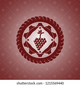 bunch of grapes icon inside badge with red background