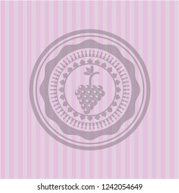 bunch of grapes icon inside badge with pink background