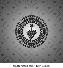 bunch of grapes icon inside black badge