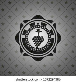 bunch of grapes icon inside black badge