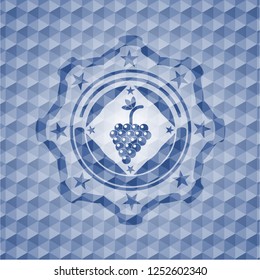 bunch of grapes icon inside blue polygonal badge.