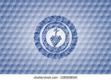 bunch of grapes icon inside blue badge with geometric pattern background.