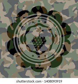 bunch of grapes icon inside camo emblem