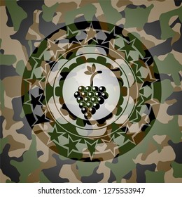 bunch of grapes icon inside camouflaged emblem
