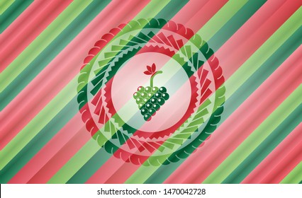 bunch of grapes icon inside christmas emblem.