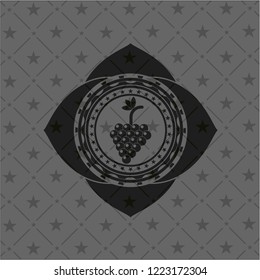 bunch of grapes icon inside dark emblem