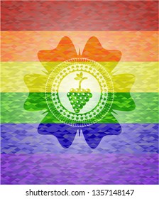 bunch of grapes icon inside emblem on mosaic background with the colors of the LGBT flag