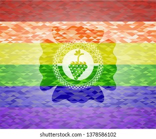 bunch of grapes icon inside emblem on mosaic background with the colors of the LGBT flag