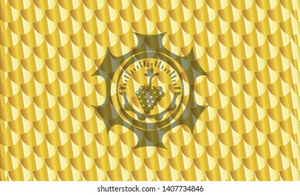 bunch of grapes icon inside gold badge. Scales pattern. Vector Illustration. Detailed.