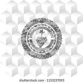bunch of grapes icon inside grey emblem with cube white background
