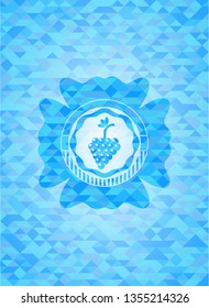 bunch of grapes icon inside light blue emblem with mosaic background