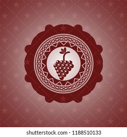 bunch of grapes icon inside red emblem. Retro