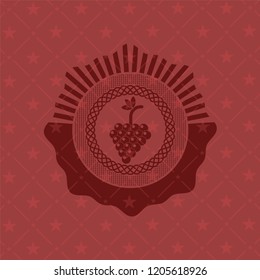bunch of grapes icon inside red icon or emblem