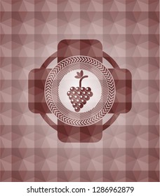 bunch of grapes icon inside red geometric pattern emblem. Seamless.