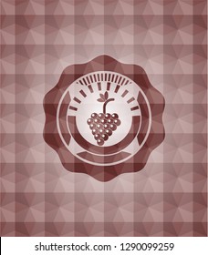 bunch of grapes icon inside red emblem or badge with abstract geometric pattern background. Seamless.