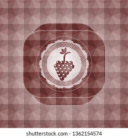 bunch of grapes icon inside red seamless badge with geometric pattern.